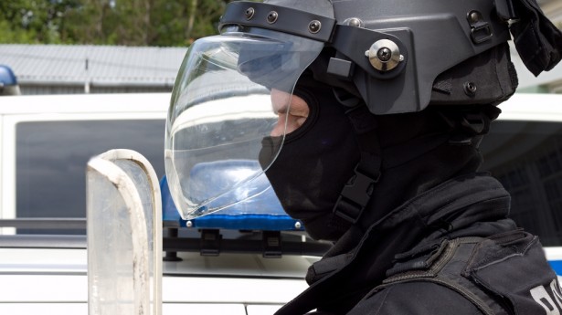 Cop-in-riot-gear-via-Shutterstock-615x345
